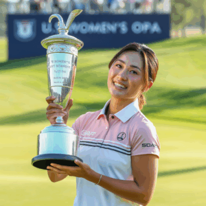 [Yuka Saso holding the U.S. Women's Open trophy after her 2024 victory]